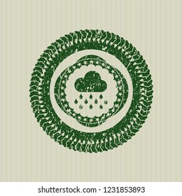 Green rain icon inside distressed rubber seal