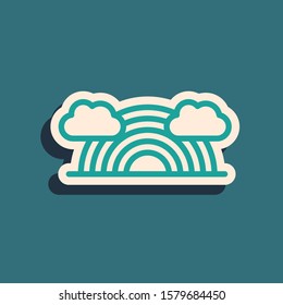 Green Rainbow with clouds icon isolated on blue background. Long shadow style. Vector Illustration