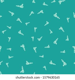 Green Ray gun icon isolated seamless pattern on green background. Laser weapon. Space blaster.  Vector Illustration