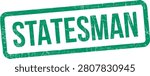 A green rectangular rubber stamp with the text Statesman, isolated on a white background....