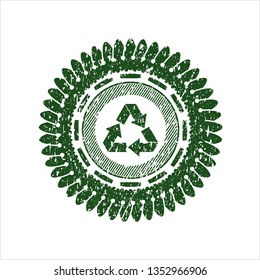 Green recycle icon inside grunge stamp