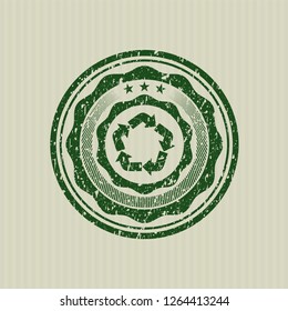 Green recycle icon inside rubber grunge texture stamp