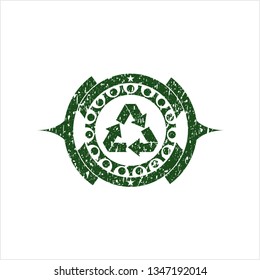 Green recycle icon inside rubber grunge texture stamp