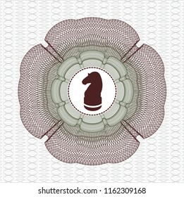 Green and Red abstract rosette with chess knight icon inside