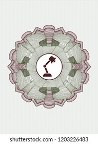 Green and Red abstract rosette with desk lamp icon inside