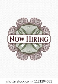 Green and Red abstract rosette with text Now Hiring inside