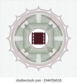 Green and Red linear rosette with film icon inside