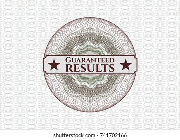 Green and Red linear rosette with text Guaranteed results inside