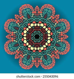 Green and red mandala on blue background. Vintage vector art