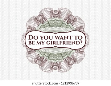 Green and Red money style emblem or rosette with text Do you want to be my girlfriend? inside
