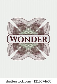 Green and Red money style emblem or rosette with text Wonder inside