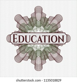 Green and Red money style rosette with text Education inside