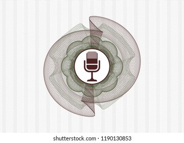 Green and Red money style rosette with microphone icon inside