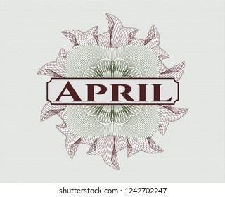 Green and Red money style rosette with text April inside