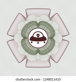 Green and Red money style rosette with ufo with aline inside icon inside