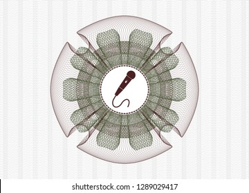 Green and Red passport money rosette with microphone icon inside