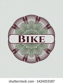 Green and Red passport money rosette with text Bike inside