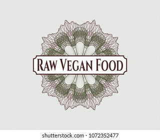 Green and Red passport money rossete with text Raw Vegan Food inside