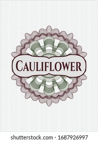 Rosette de pasaportes verde y rojo con texto Cauliflower dentro