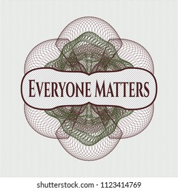 Green and Red passport rossete with text Everyone Matters inside