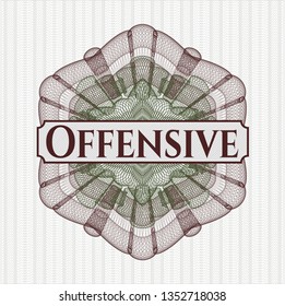 Green and Red passport style rosette with text Offensive inside