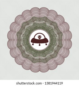 Green and Red passport style rosette with ufo with aline inside icon inside