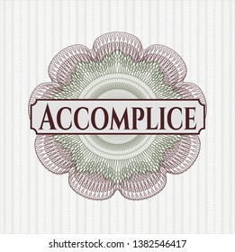 Green and Red passport style rosette with text Accomplice inside