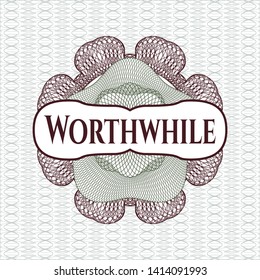 Green and Red passport style rosette with text Worthwhile inside
