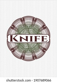 Green and Red passport style rosette with text Knife inside