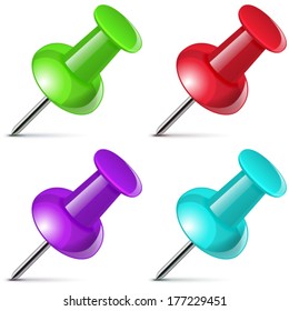 Green, red, violet, blue thumb-tack.
