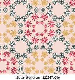 Green, red, yellow bohemian Christmas snowflakes vector seamless pattern background.