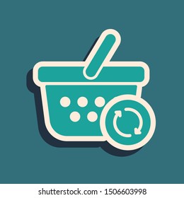 Green Refresh shopping basket icon isolated on blue background. Online buying concept.  Vector Illustration