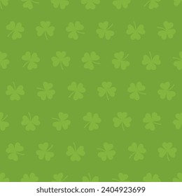 green repetitive background with shamrock shapes. vector seamless pattern. saint patrick day. fabric swatch. wrapping paper. continuous print. design element for greeting card, textile, home decor