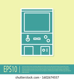 Green Retro arcade game machine icon isolated on yellow background.  Vector Illustration