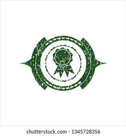 Green ribbon icon inside distressed rubber seal with grunge texture
