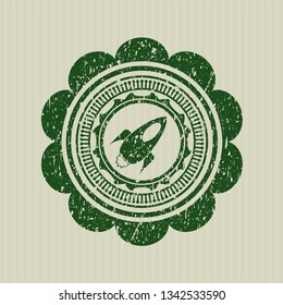 Green rocket icon inside rubber grunge texture stamp