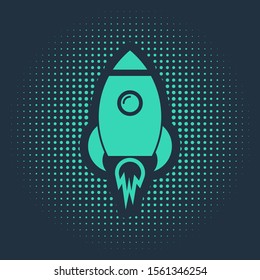 Green Rocket ship with fire icon isolated on blue background. Space travel. Abstract circle random dots. Vector Illustration