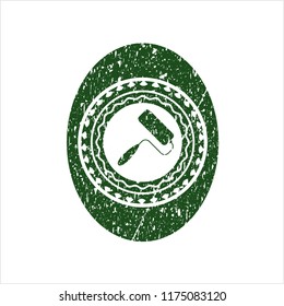 Green roller brush icon inside distress rubber grunge stamp