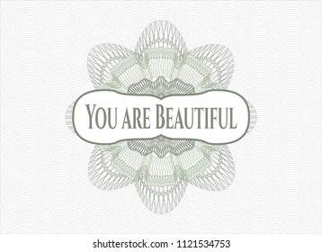 Green rosette or money style emblem with text You are Beautiful inside