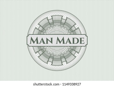 Green rosette or money style emblem with text Man Made inside