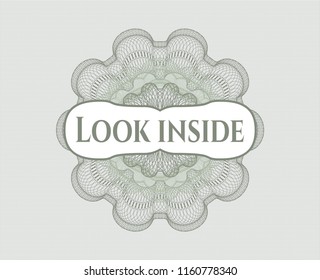 Green rosette or money style emblem with text Look inside inside
