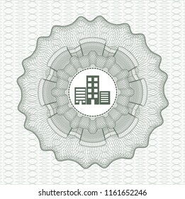 Green rosette or money style emblem with buildings icon inside