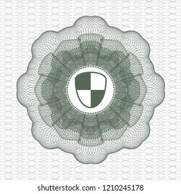 Green rosette or money style emblem with shield, safety icon inside