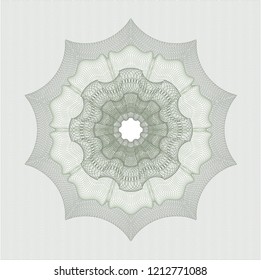 Green rosette or money style emblem