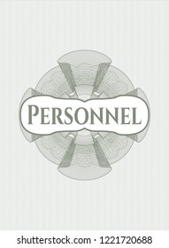 Green rosette or money style emblem with text Personnel inside