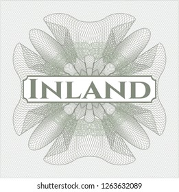 Green rosette (money style emblem) with text Inland inside
