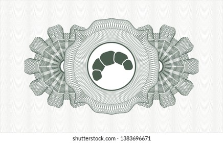 Green rosette or money style emblem with croissant icon inside