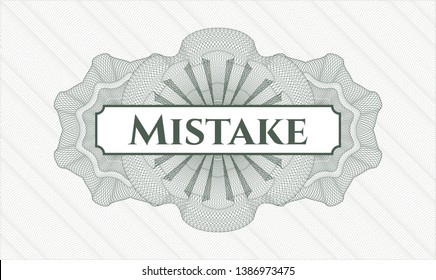 Green rosette (money style emblem) with text Mistake inside