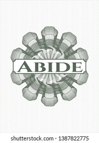 Green rosette or money style emblem with text Abide inside