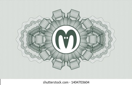 Green rosette or money style emblem with goat head icon inside